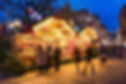 Christmas market at night under the snow